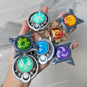 Luminoso Genshin Impact Vision Charm Ruota Lunare, Serpente a 7 Mutamenti, Natlan, Fontaine, Inazuma, Liyue, Mondstadt, Snezhnaya, Sumeru, Skirk immagine 1
