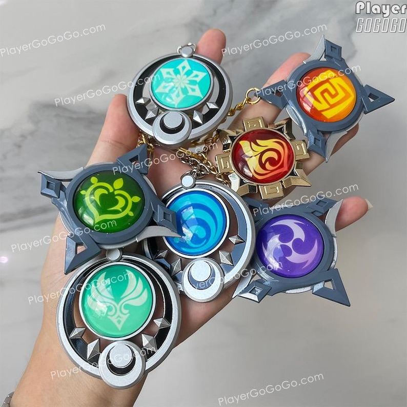 Luminoso Genshin Impact Vision Charm Ruota Lunare, Serpente a 7 Mutamenti, Natlan, Fontaine, Inazuma, Liyue, Mondstadt, Snezhnaya, Sumeru, Skirk immagine 1
