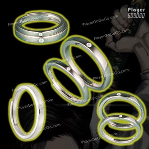 Può includere: Set di quattro anelli d'argento, ognuno con una singola pietra trasparente. Gli anelli sono impilati e disposti in cerchio.