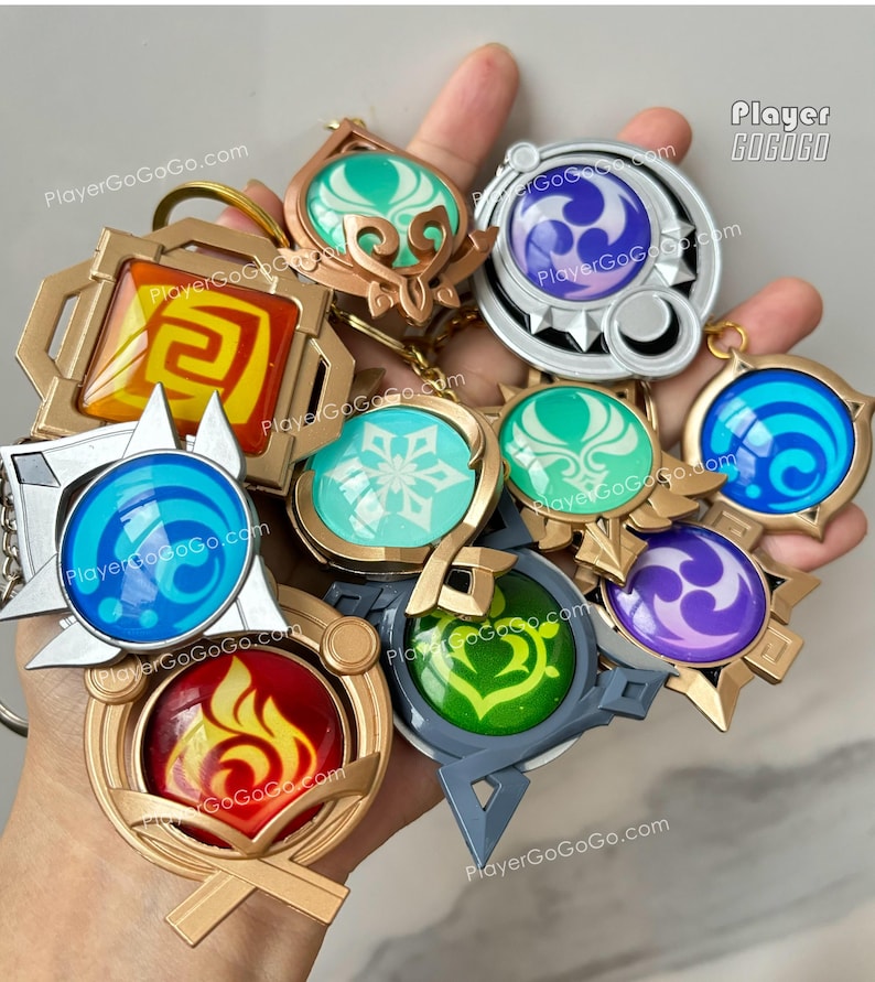 Luminoso Genshin Impact Vision Charm Ruota Lunare, Serpente a 7 Mutamenti, Natlan, Fontaine, Inazuma, Liyue, Mondstadt, Snezhnaya, Sumeru, Skirk immagine 2