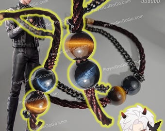 May include: A brown cord necklace with three beads. The beads are a tiger's eye, a blue tiger's eye, and another tiger's eye. The necklace is tied with a knot and has a metal chain attached to it. The text "PlayerGoGoGo" is visible in the image.