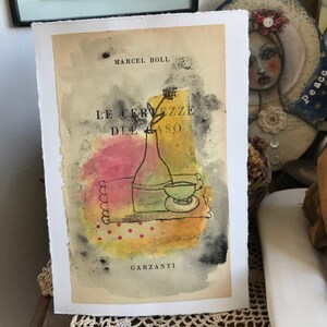 Mixed media trace monoprint on the first page of an old book le certezze del caso
