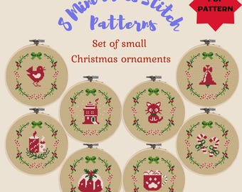 May include: Set of 8 mini cross stitch patterns for small Christmas ornaments. The patterns include a bird, a bell, a house, a cat, a candle, candy canes, a pudding, and a mug.