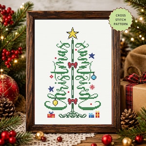 May include: A framed cross stitch pattern featuring a stylised Christmas tree formed by the green text Christmas written twice. The design includes a yellow star topper, red bows, colourful ornaments, and small gift boxes at the base.