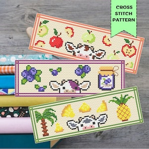 May include: Three cross-stitch patterns featuring a cow design with fruit and jam. The top pattern has apples, the middle has blueberries and jam, and the bottom has a pineapple and palm tree. The text "CROSS STITCH PATTERN" is visible.