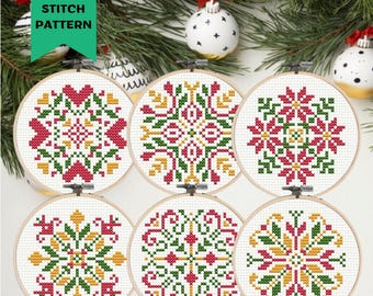May include: Six mini cross stitch patterns featuring red, green, and yellow geometric designs. The patterns are displayed in embroidery hoops.
