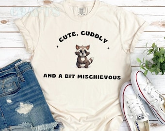 Raccoon T-Shirt Cute Cuddly and a bit Mischevious, Graphic T-Shirts, Racoon Lover, Funny T-Shirts, Raccoon Gifts, Animal Shirt, Trash Panda