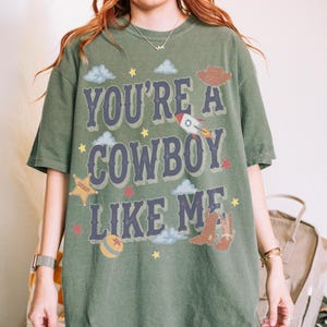 Vintage Tay Story Shirt, You're A Cowboy Like Me Shirt, Toy Story 5 Shirt, WDW Disneyland Family Vacation Trip Tee, Disney Pixar Fest Shirt Moss/Military Green