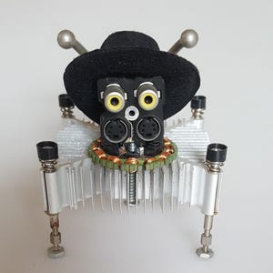 Steampunk Robot Cowboy – Recycled Tech Sculpture"
