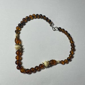 Vintage Amber Colored Beads with Cream and Gold Tone Accents