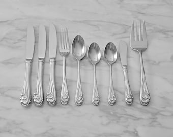 Kirk Stieff  1984 Stainless Flatware in the Breakers Pattern, Odd Set of 9