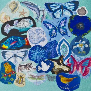 May include: A collection of fabric cutouts featuring various designs, including butterflies, fish, a whale, a pug, and a bird. The cutouts are primarily blue, with accents of yellow, red, and white. The background is a light blue patterned fabric.