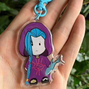 Little Jinx with a shark - acrylic keychain - arcane