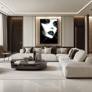 May include: A contemporary living room featuring a white sectional sofa, a dark marble coffee table, and a large artwork of a woman's face with teal accents. The room has a neutral colour palette with dark wood accents and a large window.