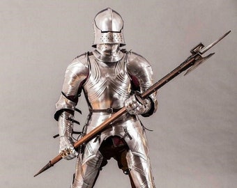 May include: A full suit of silver armor with a helmet and a long, spiked weapon.