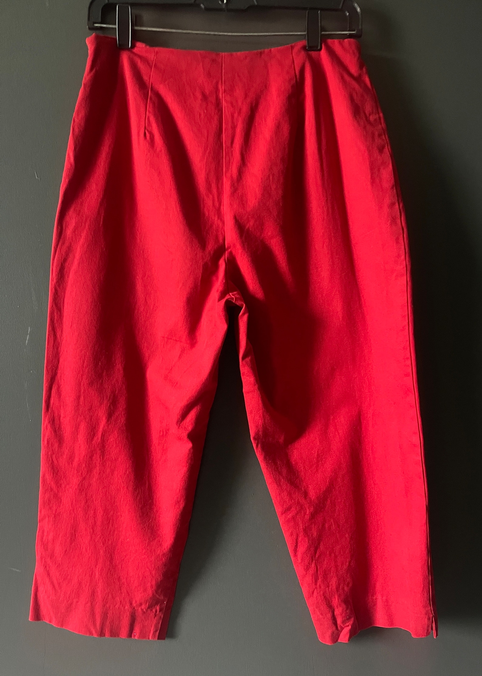 capri pants outfits  - These 1980’s red vintage Capri pants are in excellent vintage condition. They are straight legged with no pockets. There is a zipper on the right side and they are a very bright red color that will make you stand out in any crowd. The tag says: “CLIO” size 8.