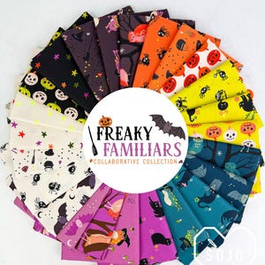 May include: A circular arrangement of folded fabric swatches featuring Halloween-themed patterns in black, orange, yellow, teal, and purple. The center features a white label with the text "FREAKY FAMILIARS COLLABORATIVE COLLECTION" and a bat.