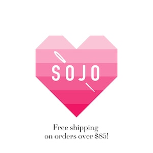 May include: A heart-shaped graphic composed of horizontal stripes in varying shades of pink, ranging from light to dark. The word SOJO is printed in white capital letters across the center, with a white needle icon angled behind the text.