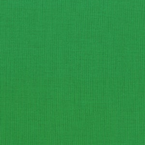May include: A solid green fabric with a textured weave. The bright green color covers the entire frame, creating a vibrant and uniform appearance. The fabric's texture is visible, adding depth to the image.