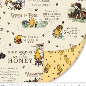 May include: Cream-colored fabric featuring Winnie the Pooh illustrations and quotes. The design includes images of Pooh Bear, Piglet, and bees, with text like "Kind Words are like Honey" and "Winnie the Pooh". The fabric is measured in inches.