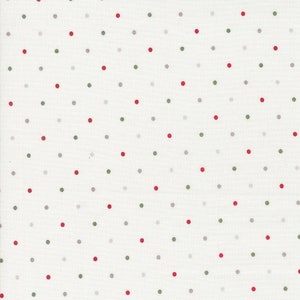 May include: White fabric with a repeating pattern of small, evenly spaced polka dots. The dots are in red, green, and gray, creating a festive and playful design. The fabric has a slightly textured appearance.