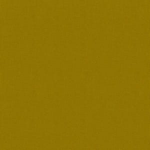 May include: A close-up shot of a solid, textured fabric in a mustard yellow color. The fabric has a woven appearance, with a subtle grid pattern visible across the surface. The color is consistent throughout the image.