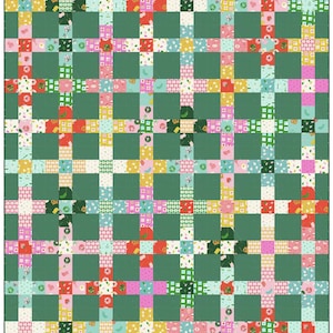May include: A quilt featuring a grid pattern of dark green solid squares alternating with intersecting strips of multi-colored fabric squares. The patterned squares display various small motifs including food items, geometric shapes, and floral prints.