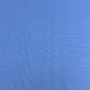 May include: A solid, light blue fabric with a slightly textured appearance. The fabric has subtle folds and creases, creating a soft, flowing look. The color is a muted, pastel shade of blue.