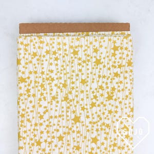 Twinkle Stars Cotton Fabric: Little Town Collection by Amy Sinibaldi