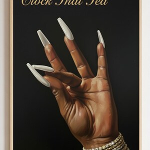 May include: A framed art print featuring a hand with long, white fingernails against a black background. The hand is adorned with multiple bracelets. The text "Clock That Tea" is written in gold script at the top of the print.