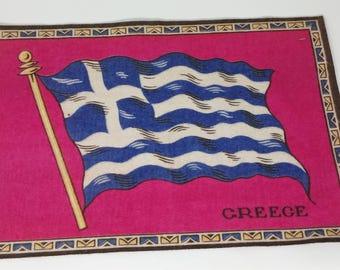 Variedad de banderas antiguas de fieltro de tabaco