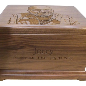 May include: A wooden cremation urn with a personalized inscription. The urn features a laser-engraved portrait of a man with the name "Jerry" and the dates "October 26th, 1958 - July 30, 2021".