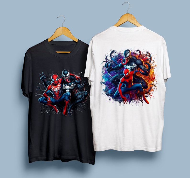 May include: Two black t-shirts with a graphic print of Spider-Man and Venom. One shirt has a white background and the other has a black background.