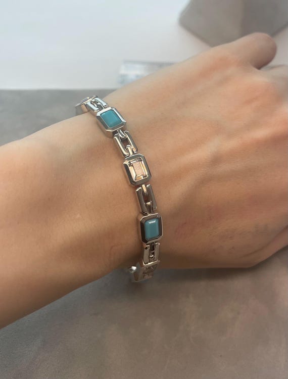 Bracciale a maglie placcato oro bianco con pietre di turchese e