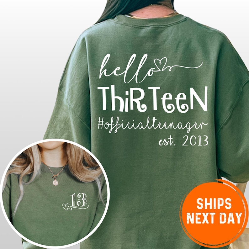 a green sweatshirt with white text and numbers on the back.