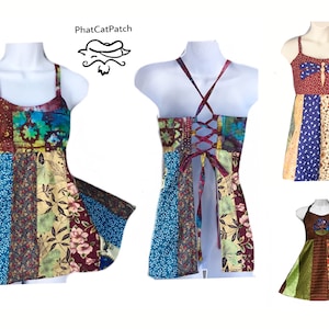 May include: A collection of patchwork dresses in various styles. The dresses feature a mix of floral, paisley, and abstract patterns in shades of blue, red, green, and brown. One dress has a crisscross back with a lace-up detail. The brand name "PhatCatPatch" is visible.