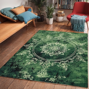 May include: A green area rug with a white mandala design. The rug has a distressed, vintage look.