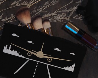 ブラックキャンバストラベルポーチ | 飛行機デザインのメイクアップバッグ | トイレタリーオーガナイザー Wanderlust ギフト