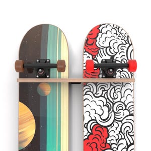 May include: Two skateboards mounted on a wall rack. The skateboard on the left has a dark blue, green, and yellow design with a planet graphic. The skateboard on the right has a white and red design with a cloud graphic.
