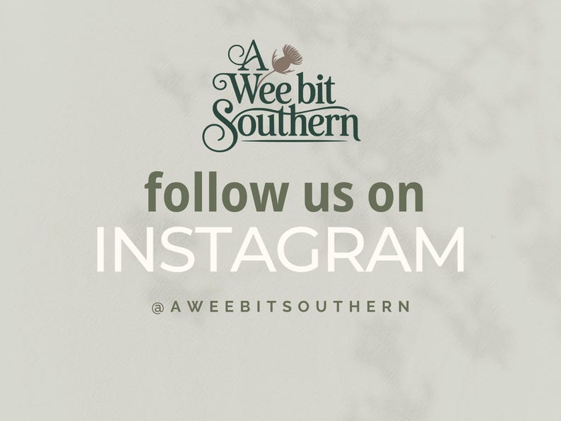 May include: A light gray graphic sign featuring the dark green text A Wee bit Southern with a thistle icon above it. Below this, the text follow us on INSTAGRAM appears in dark green and white, followed by the handle @AWEEBITSOUTHERN in dark green.