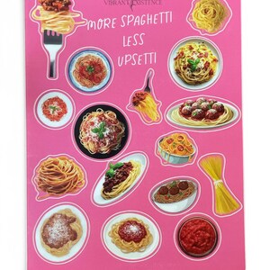 May include: A pink sticker sheet with illustrations of spaghetti dishes, such as spaghetti with meatballs and tomato sauce. The text "MORE SPAGHETTI LESS UPSETTI" is displayed on the sheet.