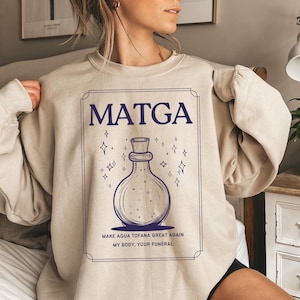 Rendre la chemise Aqua Tofana géniale, la chemise matga, la chemise drôle, la chemise féministe, le sweatshirt unisexe