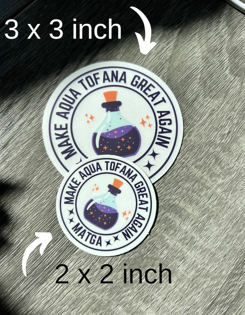May include: Two round stickers with a white background and black text. The larger sticker is 3 inches in diameter and the smaller sticker is 2 inches in diameter. Both stickers feature a purple potion bottle with stars and the text "Make Aqua Tofana Great Again".