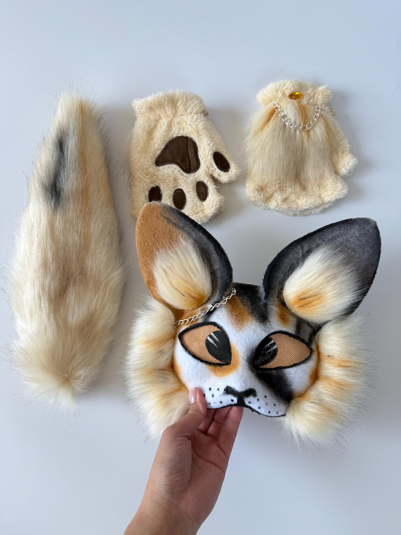 Brown White mask
Mask for Therian
daughter gifts
Theriotype Cat
Therian Kitty Mask
mask name Rockstar
mask for girl
Cat Mask and Tail
Feline Cat Cosplay
Handmade Mask
Quadrobics Mask
Teen Christmas Gift
therian gear Set