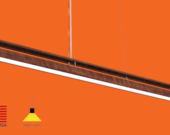 May include: A long, rectangular, wooden pendant light fixture with a white LED light strip. The fixture is suspended from the ceiling by a thin wire. The light fixture is made in the USA.  Direct light.
