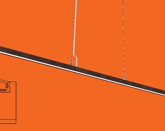 May include: A brown rectangular pendant light fixture with a white cord hanging from the ceiling. The fixture is 1 inch wide and 1 inch tall.