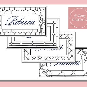 May include: Black and white name cards with floral and geometric designs. The cards feature names like "Rebecca", "Amor", and "Thomas" in elegant script. The cards have a stained glass effect, with floral accents.