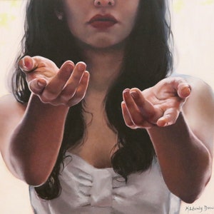 May include: A woman with long dark hair is wearing a white dress. She is holding out both hands, palms up, as if offering something.