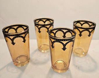 Set of Four Gold Iridescent Small Glasses with Black Decor Edge
