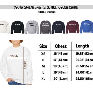 May include: Youth sweatshirt size and color chart with a white sweatshirt and color swatches in white, black, sport grey, dark heather, navy, maroon, and royal. The chart includes chest and length measurements in inches and centimeters.